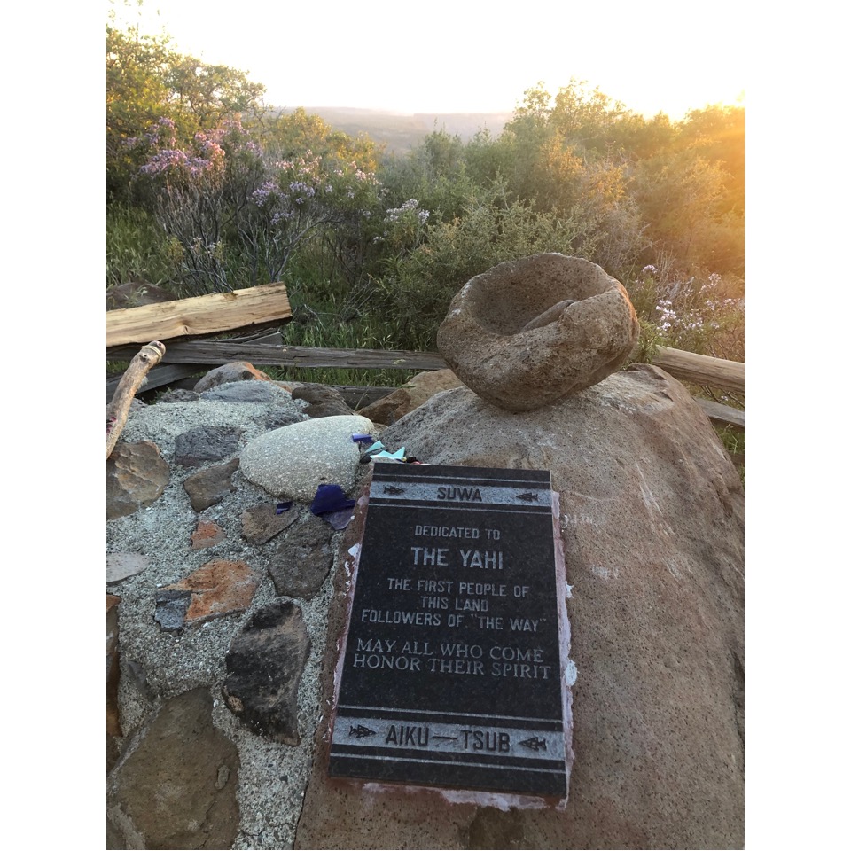 A picture containing text, stone
Description automatically generated