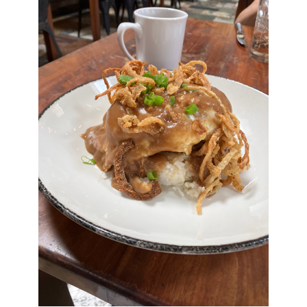 A plate of food on a table

AI-generated content may be incorrect.