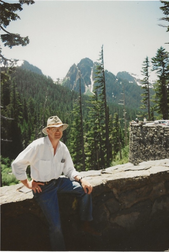 A person sitting on a rock

Description automatically generated with medium confidence